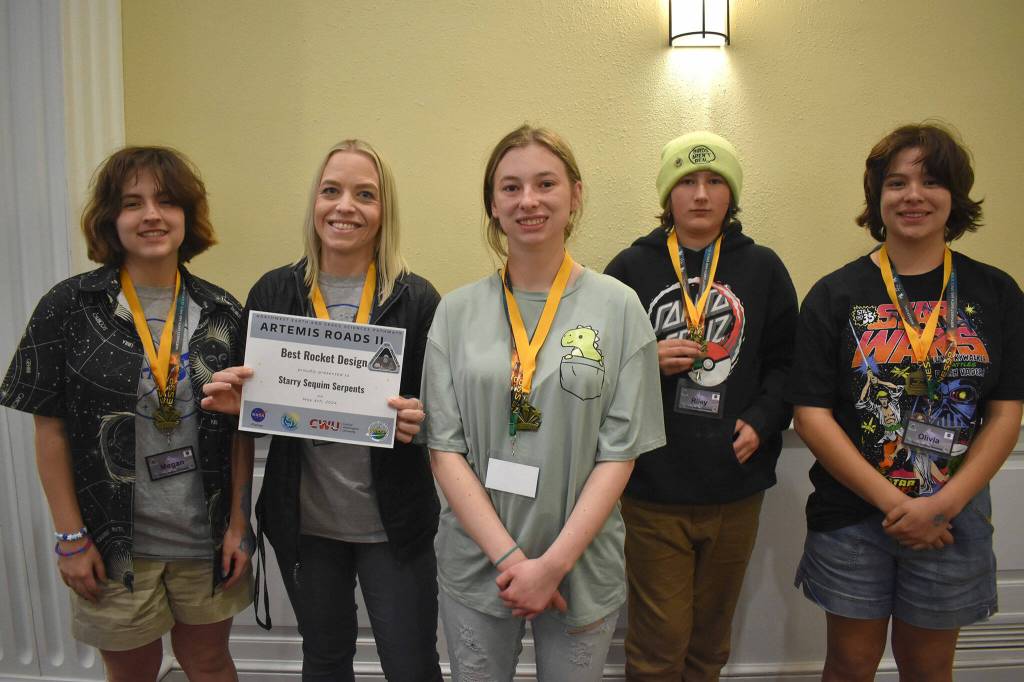 Photo courtesy Sara Turner
In May, members of the Starry Sequim Serpents team from Sequim Middle School won Best Rocket design at a regional hub event for the Artemis ROADS II student project. They went on to win one of 15 free trips to the Kennedy Space Center. They include, from left, Megan Reeves, advisor/teacher Sara Turner, Allee Deering, Riley Guimond, and Olivia Lozano.