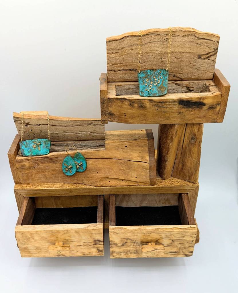 Photo courtesy of Blue Whole Gallery / See artwork by Jeff Considine and Laura Moore (pictured) and others at the Blue Whole Gallerys October 2024 exhibit,  Bright and Beautiful.