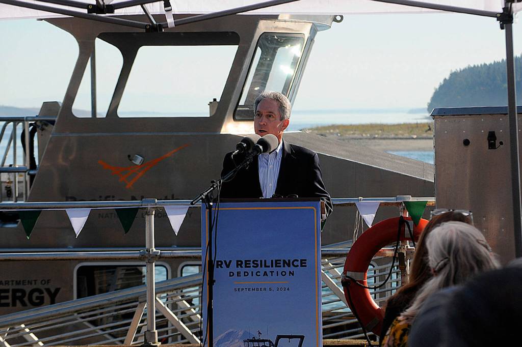 Sequim Gazette photo by Matthew Nash/ PNNL Laboratory Director Steve Ashby talks to a crowded audience during the christening ceremony for the RV Resilience.
