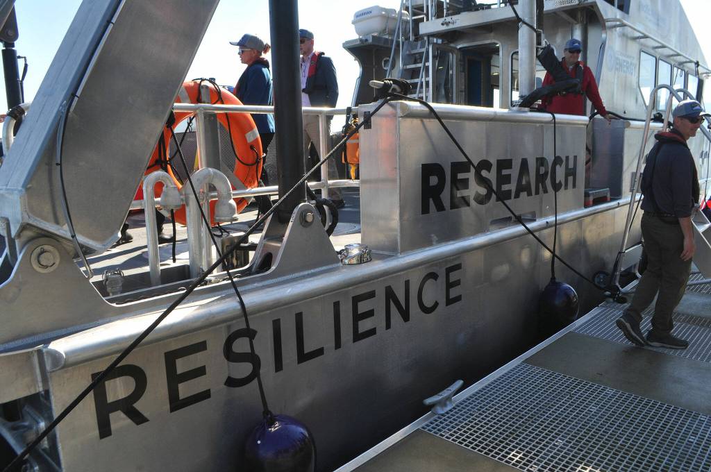 The RV Resilience can travel up to 23 knots by its diesel engine or 7 knots by electric. It features laboratory space, a large deck for up to 5,000 pounds of equipment, an A-frame, and a knuckle crane to help move equipment.