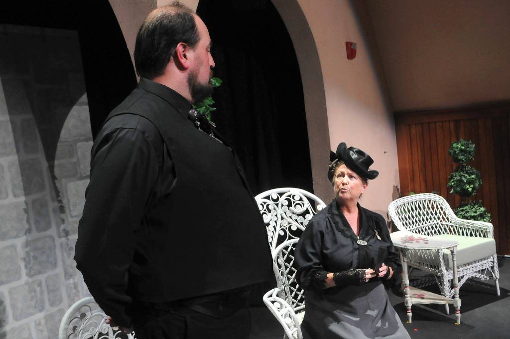 Sequim Gazette photo by Matthew Nash/ Lady Bracknell (Janice Parks) interviews Jack/Ernest (Sean Stone) to see if hes fit to marry her daughter Gwendolen.