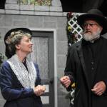 Sequim Gazette photo by Matthew Nash/ Miss Prism (Diane Smith) and Dr. Chasuble (Pete Griffin) discuss marriage during a scene in The Importance of Being Earnest.