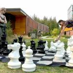 Photo by Keith Thorpe/Olympic Peninsula News Group
Nova Hines, left, and Nic Marquardt, both of Sequim, play a game of chess on an oversized board during the 2024 Fall Spectacular at Peninsula College in Port Angeles on Sept. 7. The event featured food, music, informational displays and activities for children and adults.