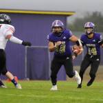 Sequim Gazette photo by Michael Dashiell
Sequims Liam Wiker, left, finds some running room in the Wolves 36-14 loss to Franklin Pierce on Sept. 13, with teammate Zeke Schmadeke looking on.The pair combined for 126 rushing yards in the loss.