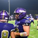 Sequim Gazette photo by Michael Dashiell / Sequims Malachi Hampton, left, and teammate Liam Wiker talk after Hamptons 73-yard touchdown in the fourth quarter of SHS Sept. 13 game against Franklin Pierce.