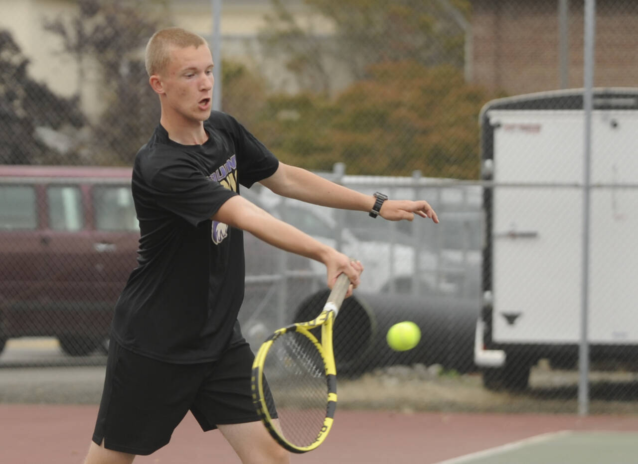 Sequim Gazette photo by Michael Dashiell
Sequims Jack Crecelius returns a volley against Kingstons as the Wolves take on the Buccaneers on Sept. 10. SHS topped the Bucs, 4-3. Crecelius won both of his matches last week to help Sequim to a 2-0 start.