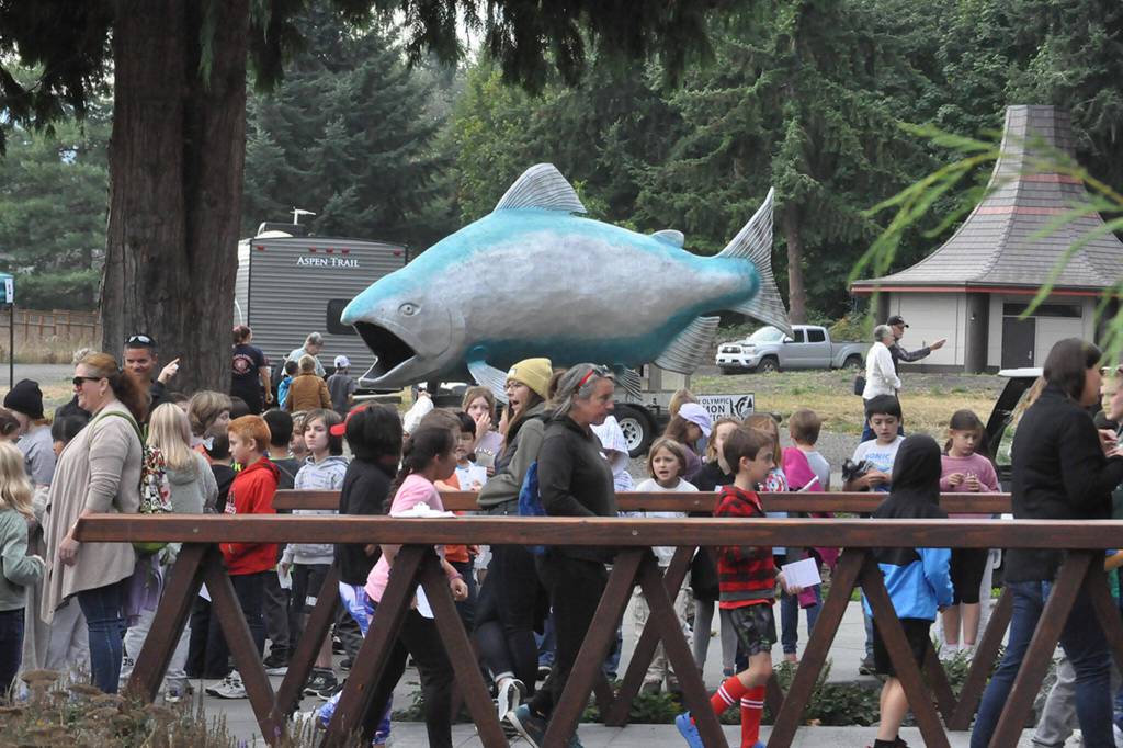 Students and chaperones line up at the 2023 Dungeness River Festival to enjoy many different stations that highlight efforts to conserve the Dungeness watershed. The festival runs one day at Sept. 27.