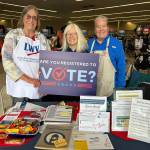 Sequim Gazette photo by Matthew Nash/ Volunteers, from left, Barbara VanderWerf, Maren Halverson and JP Persall with the League of Women Voters of Clallam County answered questions at Sequim Goodwill about voter registration, ballots and more on Sept. 17 during an information session held in conjunction with the stores in Sequim and Port Angeles on National Voter Registration Day. Persall they are a nonpartisan group and merely help people vote, not tell them how to vote.