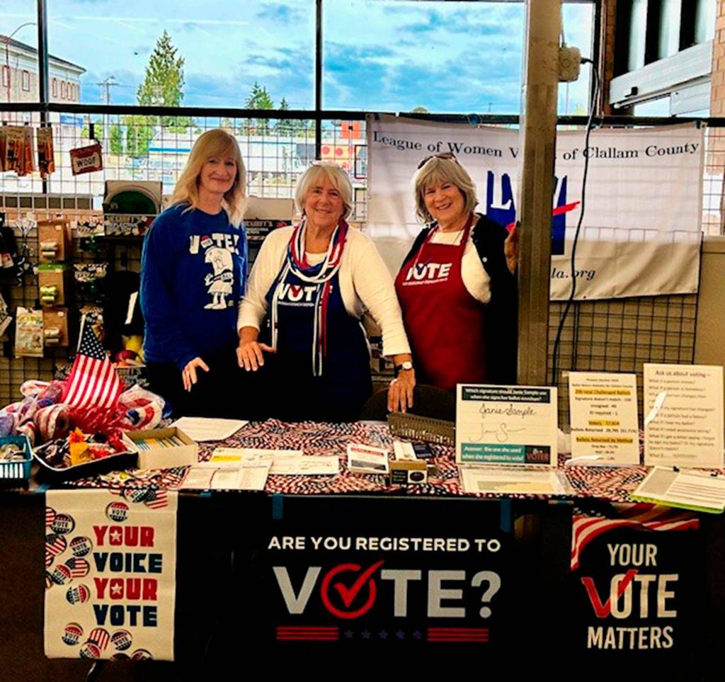 Photo courtesy Stephanie Sherman/ League of Women Voters of Clallam County, from left, Nancy Slocum, Stephanie Sherman, Gayle Fortson participated in an informational booth on Sept. 17 inside the Port Angeles Goodwill to answer questions and register voters for National Voter Registration Day.