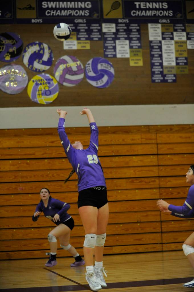 Sequim Gazette photo by Michael Dashiell / Sequims Kenzi Berglund (23) looks to set teammate Brianna Palenik (background) in a Sept. 19 home match against Bainbridge on Sept. 19.