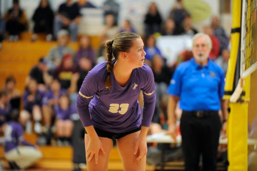 Sequim Gazette photo by Michael Dashiell / Sequims Kenzi Berglund awaits a Bainbridge serve as the Wolves take on the visiting Spartans on Sept. 19.