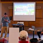 Sequim Gazette file photo by Michael Dashiell / Seabrook CEO Casey Roloff and Sam Nielson, Seabrooks vice president of engineering and entitlements, talk with community members about a proposed development adjacent to Sequim Bay at the John Wayne Marina on April 23.
