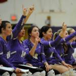 Sequim Gazette photo by Michael Dashiell / One point to go: Sequims bench signals the end of the match as the Wolves sweep rival Port Angeles at home on Sept. 26.