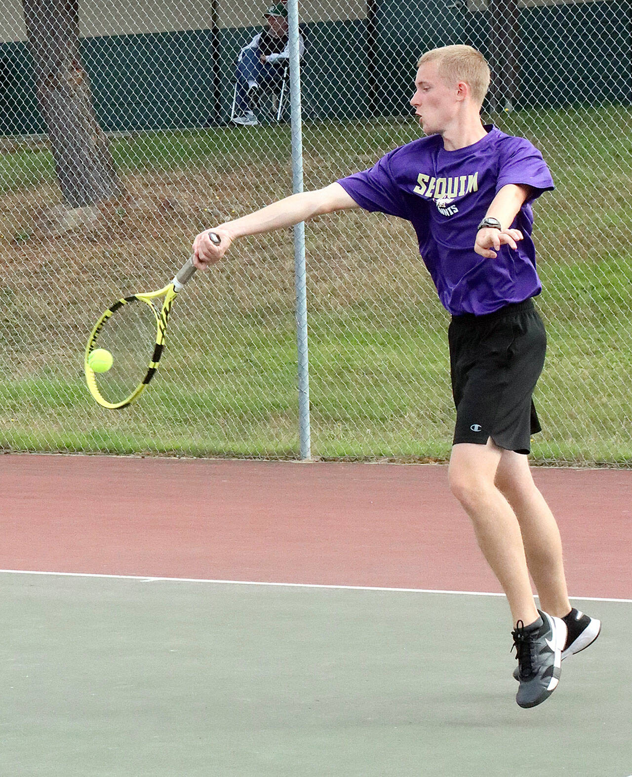 Photo by Dave Logan/for Olympic Peninsula News Group
Sequims No. 1 singles player Jack Crecelius returns a volley against Port Angeles Tate Alton on Sept. 23.