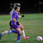 Sequim Gazette photo by Michael Dashiell / Sequims Kiley Winter, foreground, vies for possession with a Port Angeles defender in the second half of a 3-2 PA victory in Sequim on Set. 26.