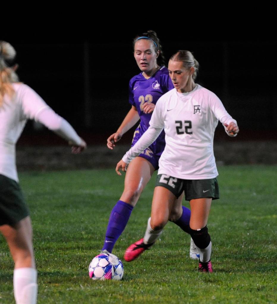 Sequim Gazette photo by Michael Dashiell
Sequims Haley Wagner, challenges Port Angeles Teanna Clark for the ball as the Wolves and Roughriders clash in overtime on Sept. 26.