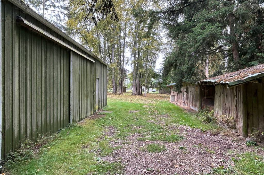 Sequim Gazette photo by Matthew Nash/ In 2006, Anton Toni and Rosa Gerhardt signed an agreement to give their property (now Gerhardt Park) to the City of Sequim after their deaths in exchange for a domestic water connection. They bought the property in 1973 and stipulated that the city must keep it as a park. Now city staff look to auction off an older home and outbuildings to make room for future park amenities.