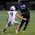 Sequim Gazette photo by Michael Dashiell / Sequim wide receiver Ethan Melnick, right, looks to get past Port Angeles Blake Sohlberg in the Wolves 27-7 Rainshadow Rumble win over the Roughriders on Sept. 27.