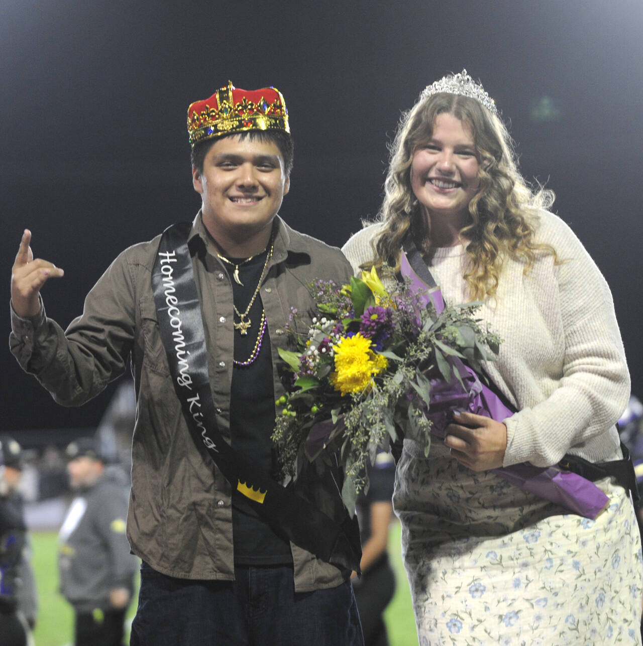 Sequim Gazette photo by Michael Dashiell / Sequim High School celebrated their Homecoming  and Homecoming royalty  at halftime of the Sept. 27 football game against rival Port Angeles. The Wolves topped rival Port Angeles 27-7 in their annual Rainshadow Rumble game. Pictured are Homecoming King Israel Torres and Queen Paige (Skylar) Krzyworz.