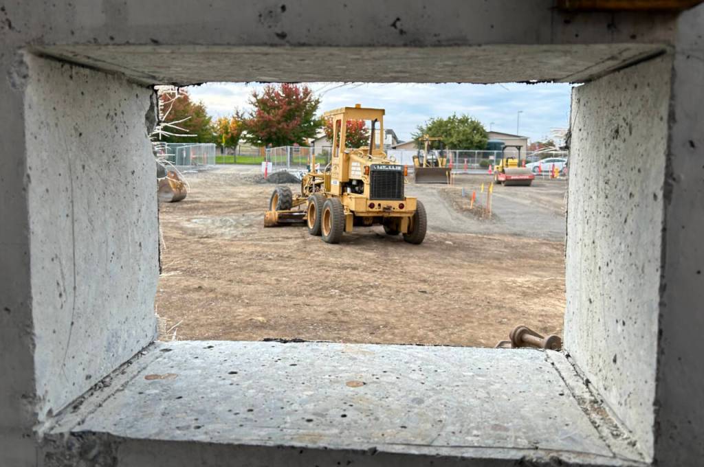 Sequim Gazette photo by Matthew Nash/ Looking out from the new Sequim Library, the space will offer two drop boxes for media, and sometime likely after opening in spring 2025 a holds locker, similar to a vending unit outside that library patrons can use 24/7 to pick up their items.