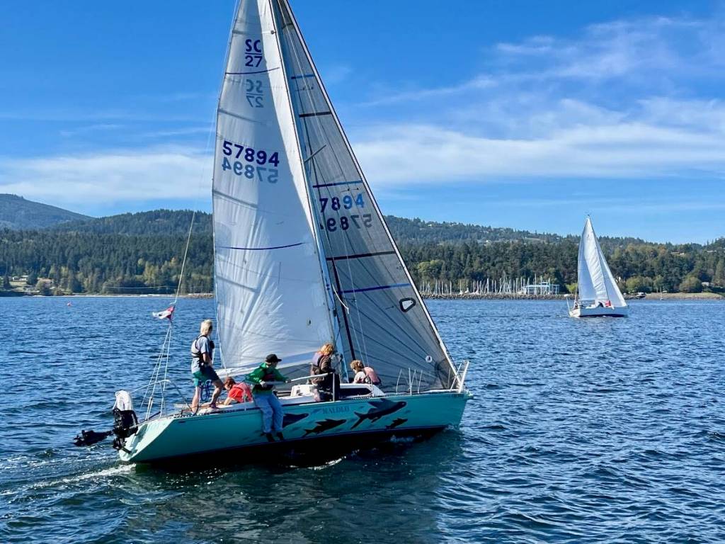 Photo courtesy of Sequim Bay Yacht Club
Malolo, with four high school students and skipper Fern Knobel, bested Sirius  skippered by former SBYC commodore Durkee Richards  in the Class B category at the Reach & Row for Hospice sailing regatta on Sept. 21.