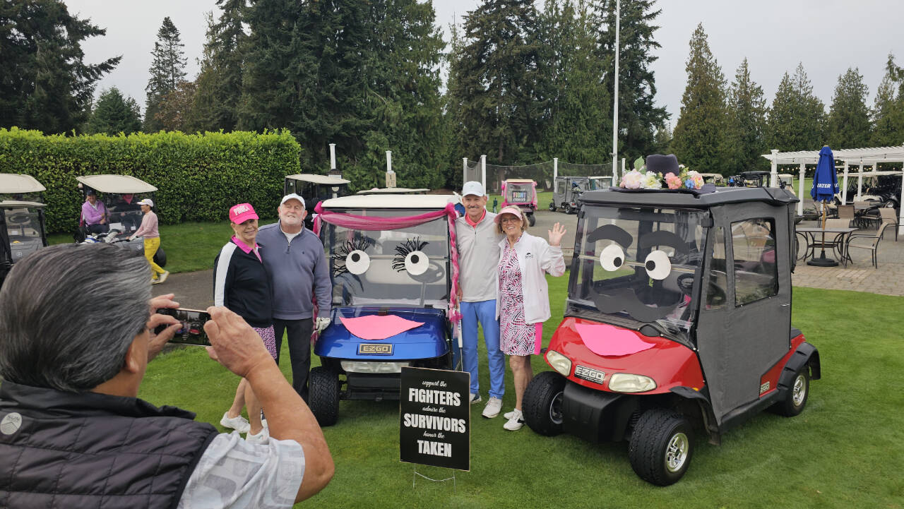 Photo courtesy of Sunland Womens Golf Association
At left, Bill Alcayaga gets a photo of Drive for the Cure Tournament participants (from left) Judy Flanders, Phil Turner, Jay Tomlin and Cheryl Coulter.