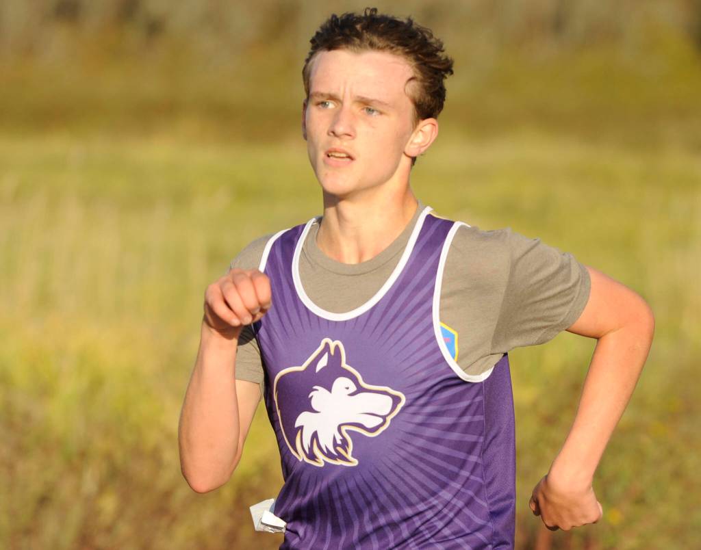 Sequim Gazette photo by Michael Dashiell / Sequim freshman Westley French competes in an Olympic League cross country meet at Voice of America at the Dungeness Recreation Area on Oct. 2.