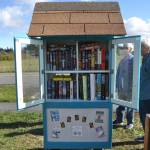 Sequim Gazette photo by Matthew Nash/ The newly expanded Little Free Library at the Olympic Unitarian Universalist Fellowship in Agnew is double-sided, rain-proof, and available to anyone for free.