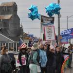 Sequim Gazette photos by Matthew Nash
Walkers during the Womens March for Humanity continue down the south side of Washington Street after walking from Sequim Avenue to Fifth Avenue holding various campaign and political signs.