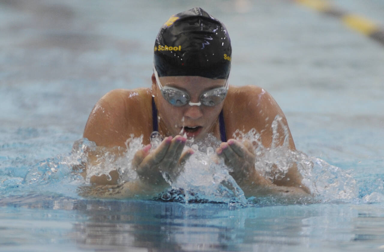 Sequim Gazette photo by Michael Dashiell / Sequims Annie Ellefson competes in the breaststroke portion of the 200 medley relay in the Wolves Oct. 9 home meet against East Jefferson. Sequim won the event in 2:11.69.