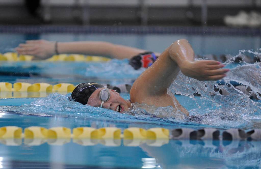 Sequim Gazette photo by Michael Dashiell / Sequims Annie Ellefson competes in the 200 freestyle event in the Wolves Oct. 9 home meet against East Jefferson. Ellefson won the event with a 2:23.82 finish.
