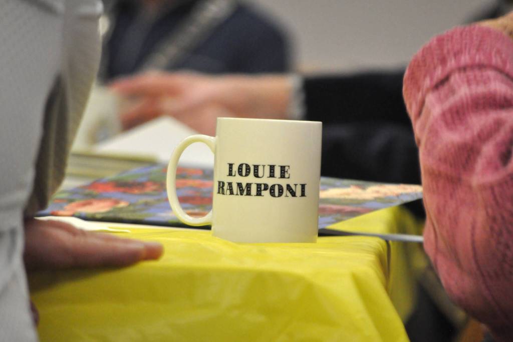 Sequim Gazette photo by Matthew Nash/ Marylaura Ramponi sat with her late husband Louies personalized Sequim Masonic Lodge mug at an Oct. 17 coffee meeting where she presented Sequim School District $500,000 for a new vocational building. Marylaura said the day was extra special because it was Louies 89th birthday.