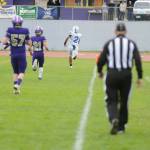 Sequim Gazette photo by Matthew Nash/ Olympics Chace Webster rushes to an 80-yard touchdown in the second quarter against the Sequim Wolves on Oct. 19. The Trojans won 28-7.