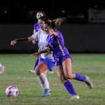 Sequims Ruby Moxley-Horgan, right, jockeys for position during the Wolves 5-0 win over Olympic at home on Thursday.