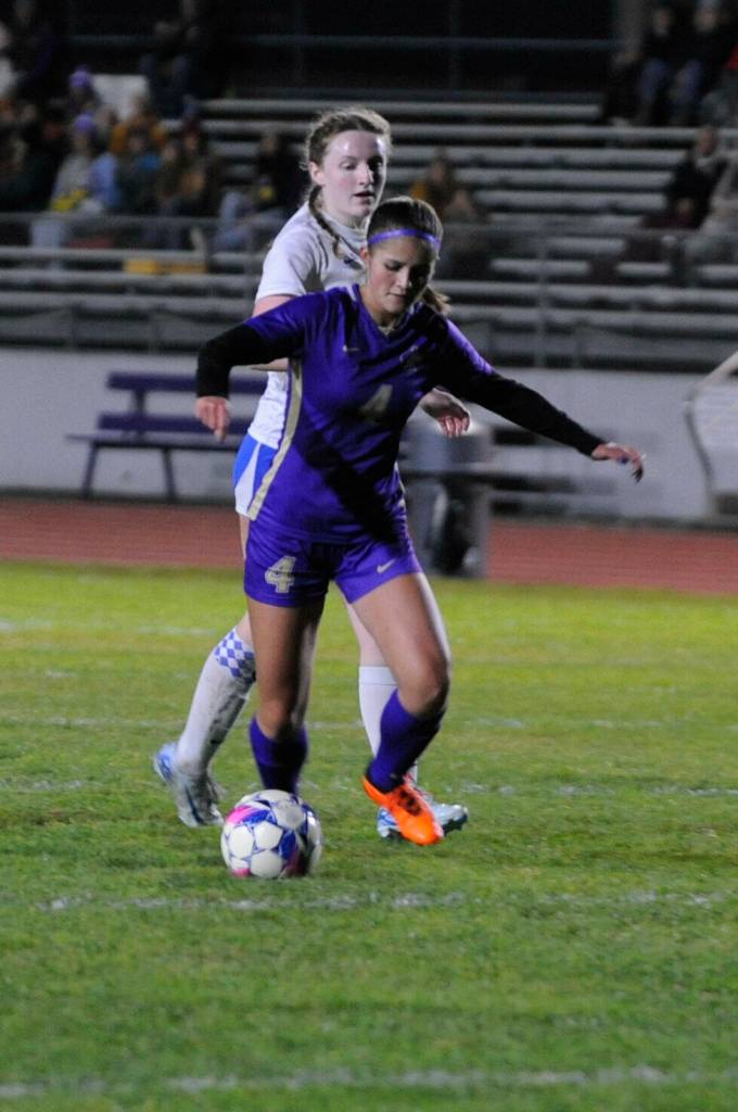 Raimey Brewer (4) advances the ball in 5-0 win over Olympic on Oct. 17.