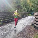 Photo by Pierre LaBossiere/ Olympic Peninsula News Group/ Sara Kuethe of Bainbridge Island won the womens 10K at the inaugural Spruce Railroad Run at Lake Crescent on Saturday, Oct. 19.