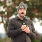 Sequim Gazette photo by Michael Dashiell / Sterling McCord speaks at the dedication of property that is named for his mother, Ruth C. McCord, on Oct. 25. McCord recalled the time his mother took him to see the property on West Hendrickson Road prior to owning it; the previous owners family had a motorcycle, and McCord said he was excited because he thought they were going to buy it. Instead. the owner offered to sell the land to his mother. I never did get that motorcycle, McCord joked at the park dedication.