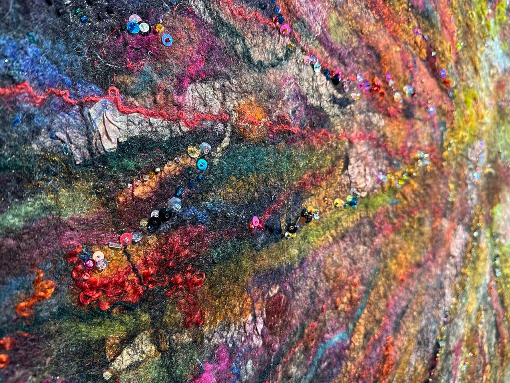 Artwork by Lora Armstrong / A detailed shot of Kaleidoscopic Super Nova by Lora Armstrong, a featured artist at the 19th-annual North Olympic Fiber Arts Festival fiber arts exhibition, Sublime Marvel – Splendor, Enterprise, & Awe at Sequim Museum and Arts, 544 N. Sequim Ave.