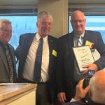Photo courtesy of Lynn Fosket
Vern Fosket of Sequim (right) accepts a NW Bandmasters honor on Oct. 27 from NW Bandmasters president Rick White and Brad McDavid.