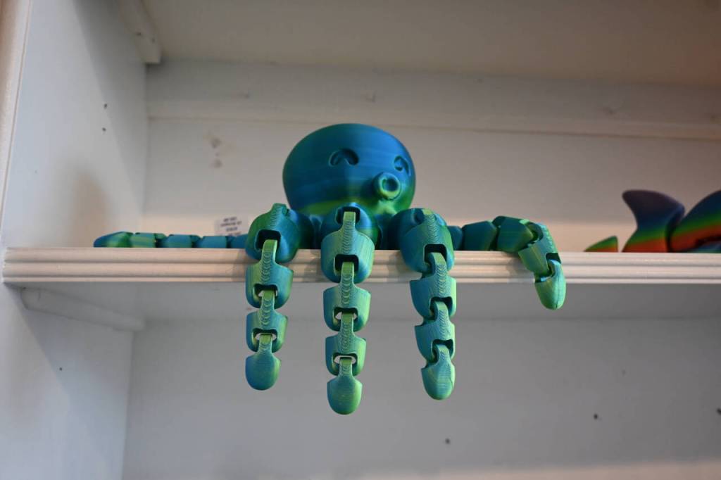 Toy maker Dexter Tedrick sells these 3-D printed toys at Crafters Creations in Creamery Square.