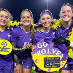 Photo by Kirsten Grove / Sequim High girls soccers four seniors celebrate a big win over Bremerton (13-1) on Oct. 29. Pictured, from left, are Amara Gonzalez, Kalli Grove, Ivy Barrett and Libby Turella.