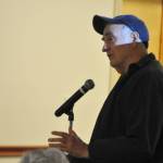 Sequim Gazette photo by Matthew Nash/ Russell Renk asks Clallam County officials about public access to the Dungeness Off-Channel Reservoir on Oct. 22. Staff said there are no final plans to fence the property and it will remain open to the public.