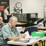 Photo by Dave Logan/for Olympic Peninsula News Group / Ray Farrell, left, and Daniel Cain, center, prepare mail-in ballots for counting on Nov. 5 at the Clallam County courthouse in Port Angeles. The tabulating machine can be seen in the background with its operator.
Photo by Dave Logan/Olympic Peninsula News Group / Ray Farrell, left, and Daniel Cain, center, prepare mail-in ballots for counting on Nov. 5 at the Clallam County courthouse in Port Angeles. The tabulating machine can be seen in the background with its operator.