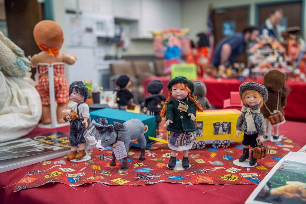 Christine Brehans collection of Orphan Train dolls, hand made by artist Elizabeth Cooper, were some of the dolls shared at the Olympic Peninsula Doll Clubs Timeless Treasures show at Sherwood Assisted Living on Saturday. The club is currently celebrating its 50th anniversary.
