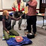 Photo courtesy of Clallam County Sheriffs Search and Rescue Team / Instructor April Grisetti of Peninsula Wild Med works with Clallam County Sheriffs Search and Rescue Team volunteers Parker Stoops, center, and Alex Serrato during a two-day Wilderness First Aid training course in early November.