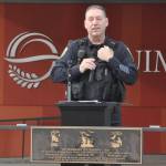 At a ceremony honoring veterans, Deputy Police Chief John Southard recognizes 11 City of Sequim staffers that served in the military. He is one of seven servicemen on the police force.