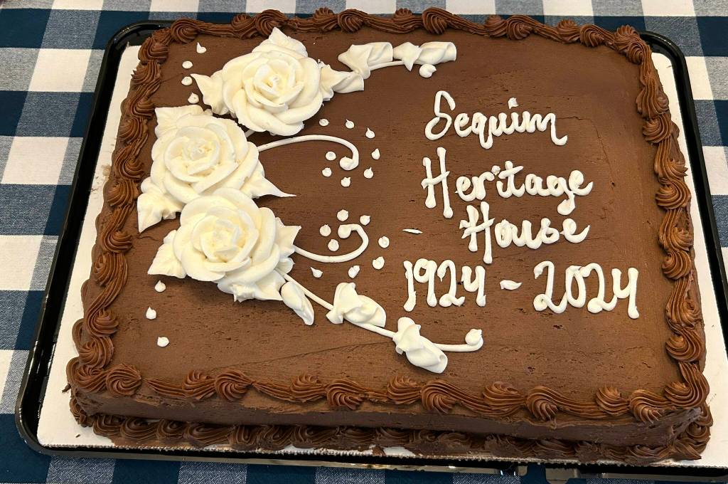 Sequim Gazette photo by Matthew Nash/ This cake commemorates Sequim Heritage House turning 100.