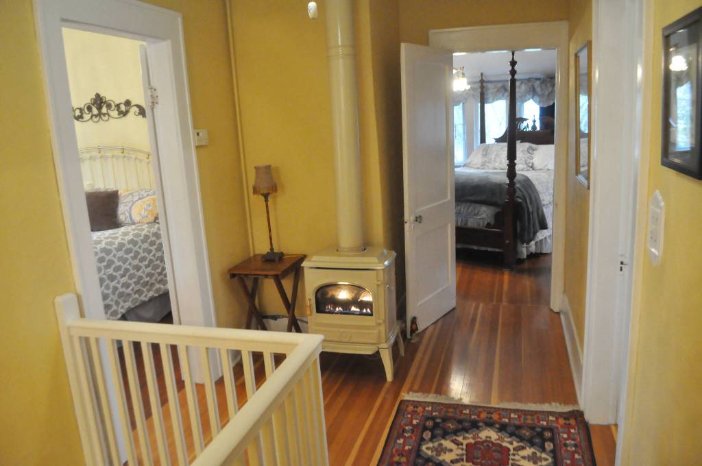 Upstairs in the Sequim Heritage House features a stove and multiple bedrooms.