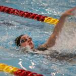 Photo courtesy Eric Ellefson/ Sequims Ava Shinkle swims the backstroke during the West Central III 1A/2A district meet, where she qualified for state in multiple events. She went on to win seventh in the 200 IM last weekend.
