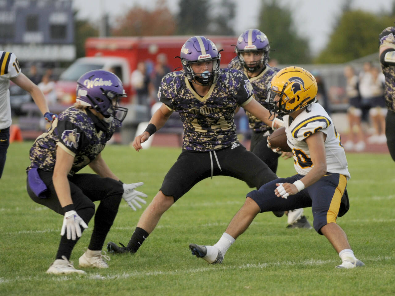 Sequim Gazette file photo by Michael Dashiell
Sequims Zeke Schmadeke, pictured readying to tackle a Forks runner earlier this season in Sequim, made the all-Olympic League first team as a defensive back.